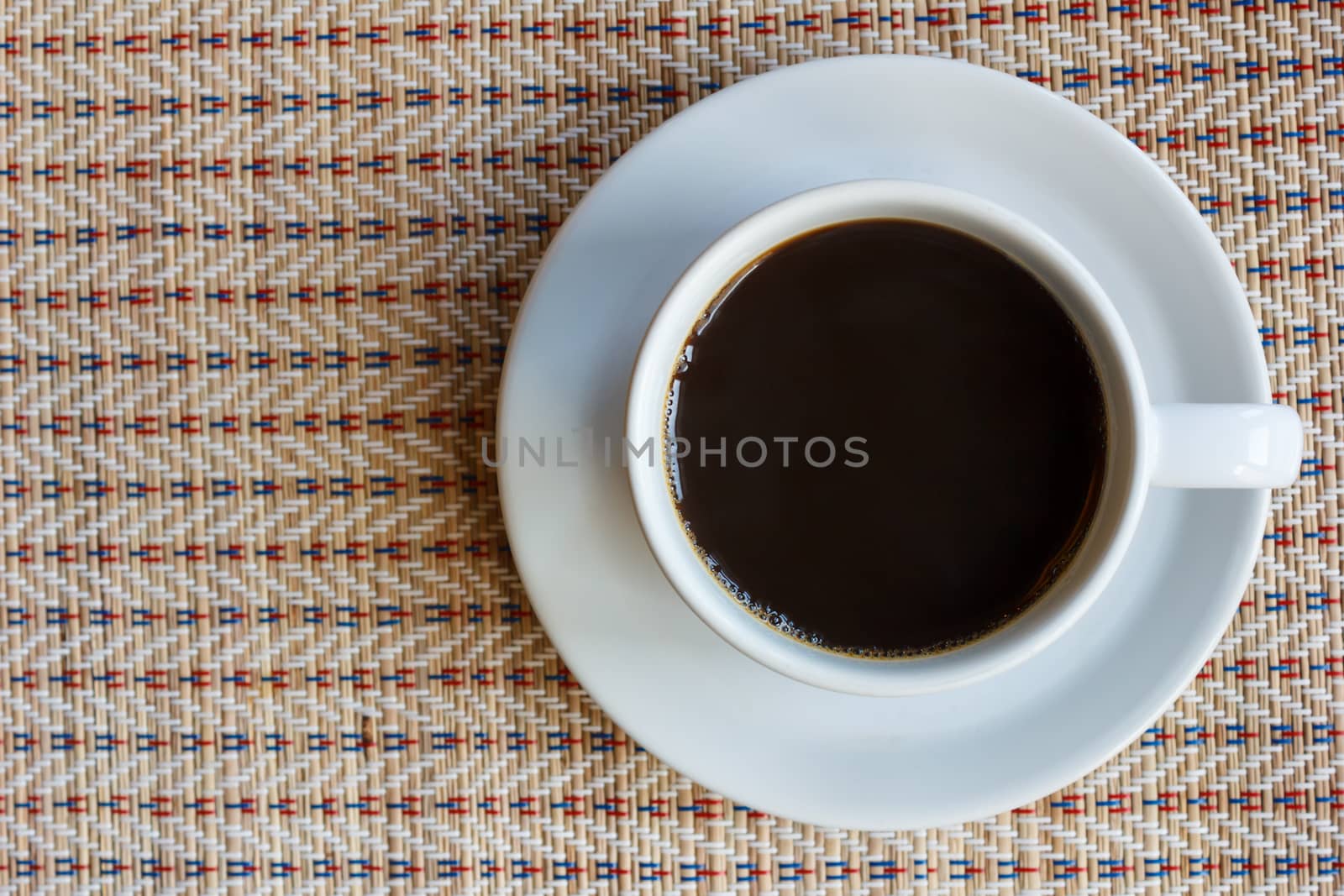 top view of cup of coffee back by vitawin