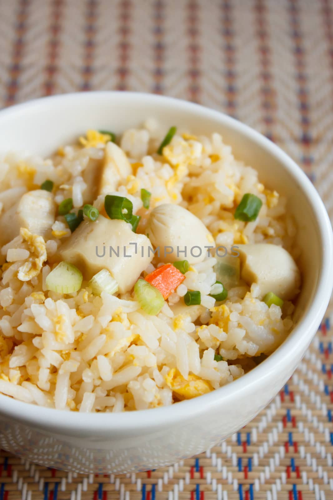 fried rice with chicken sausage on mat