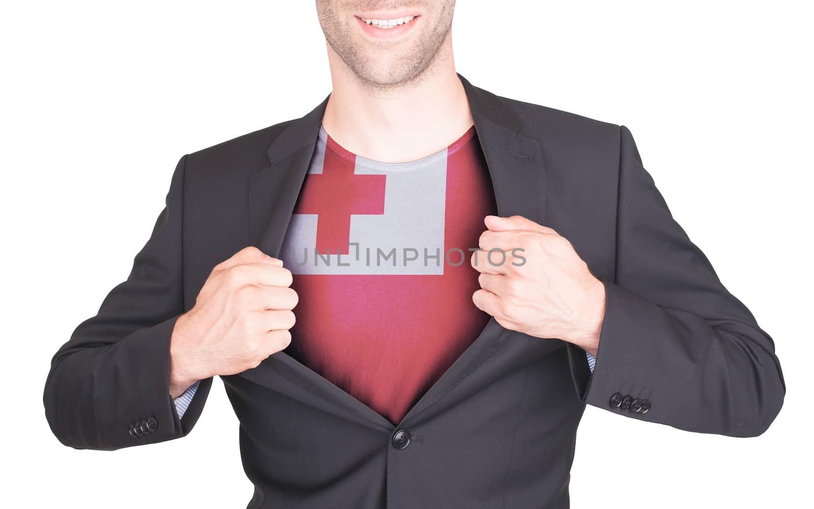 Businessman opening suit to reveal shirt with flag by michaklootwijk