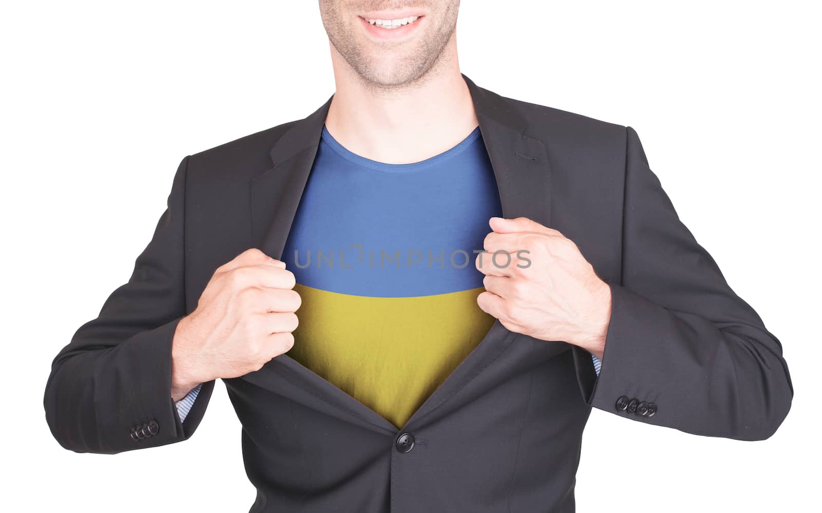 Businessman opening suit to reveal shirt with flag by michaklootwijk