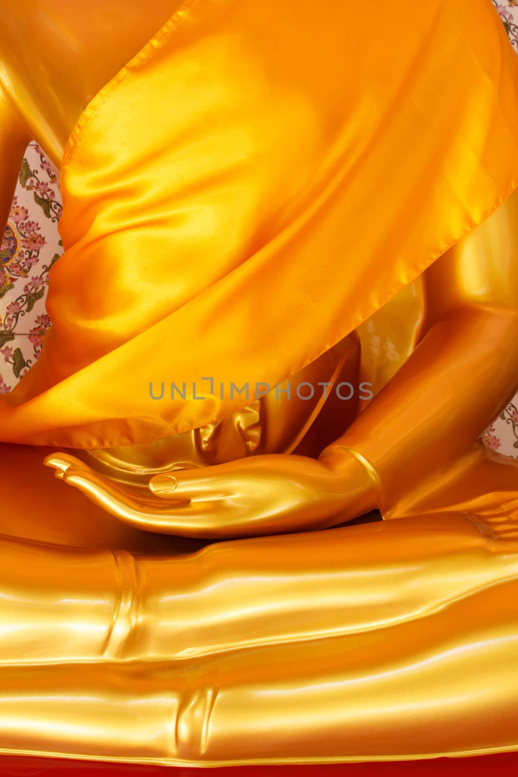 open palm hand of golden buddha statue by vitawin