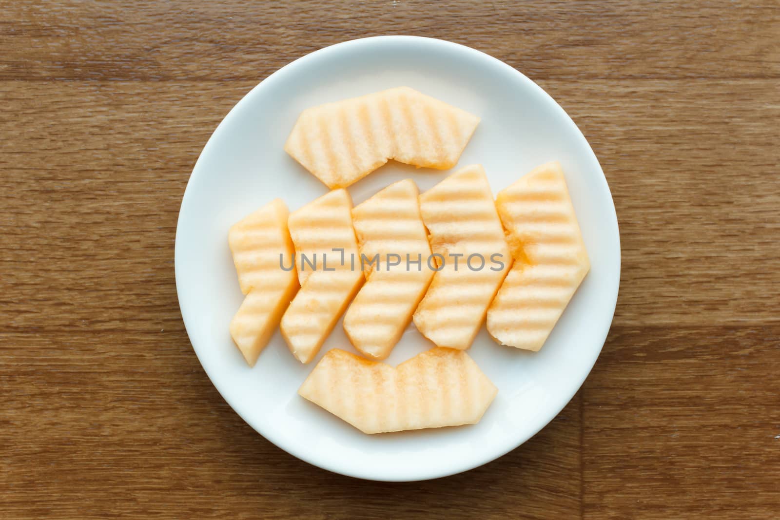 Slice of melon (Cantaloupe) on dish