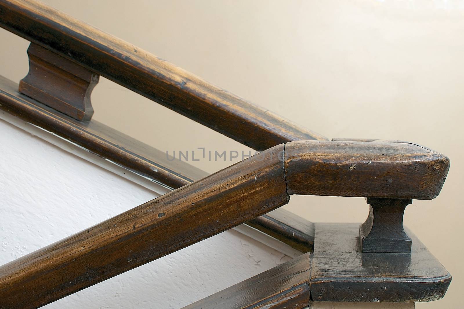 An original banister in hardwood has a soft charm 