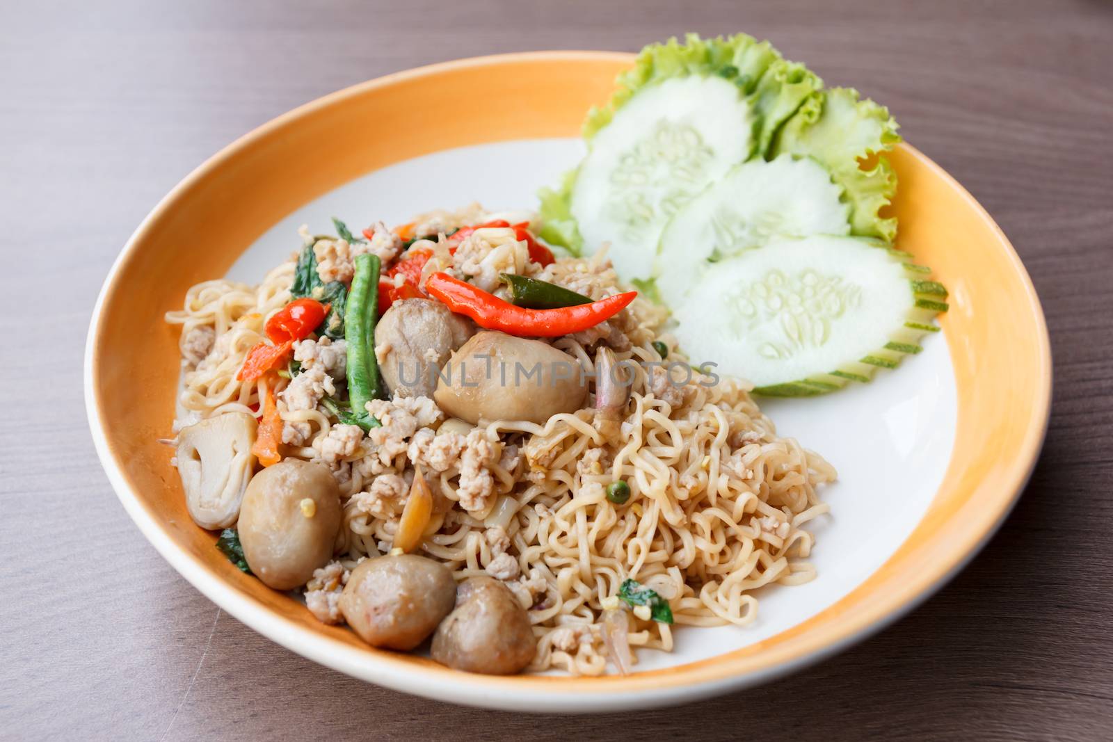 stir fried  spicy  noodle with pork and straw mushroom (thai food)