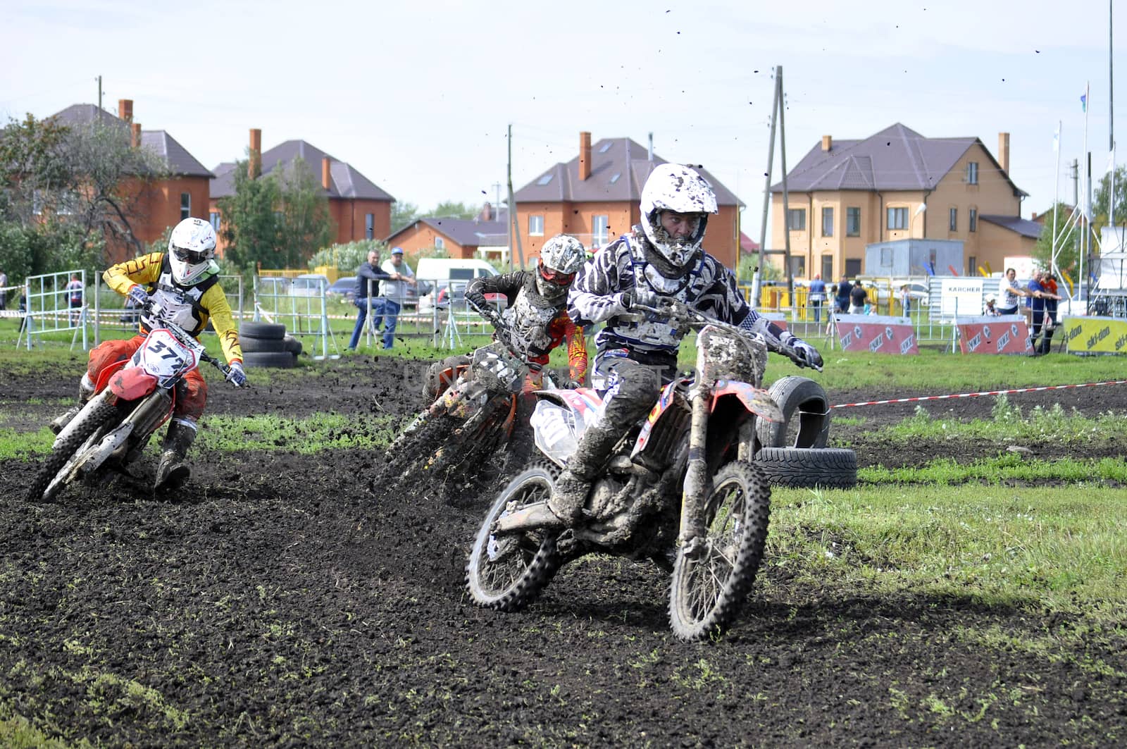 Motorcyclists on motorcycles participate in cross-country race