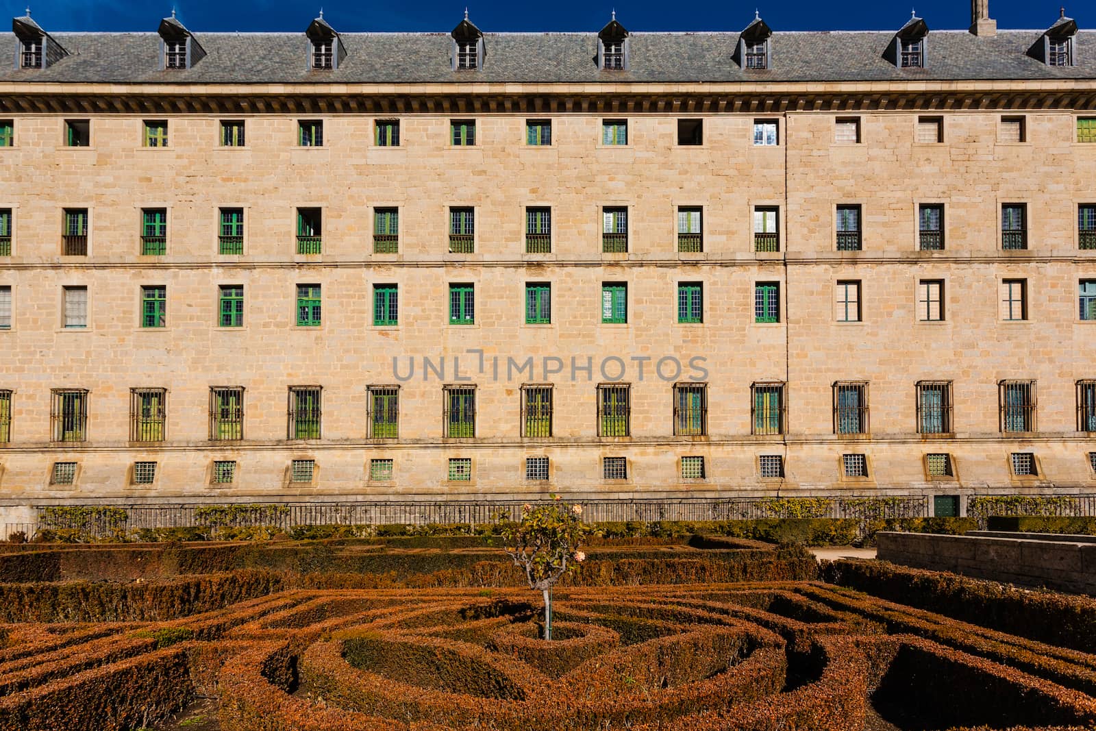 Lateral and gardens view of  the Royal Site of San Lorenzo de El Escorial next to Madrid Spain