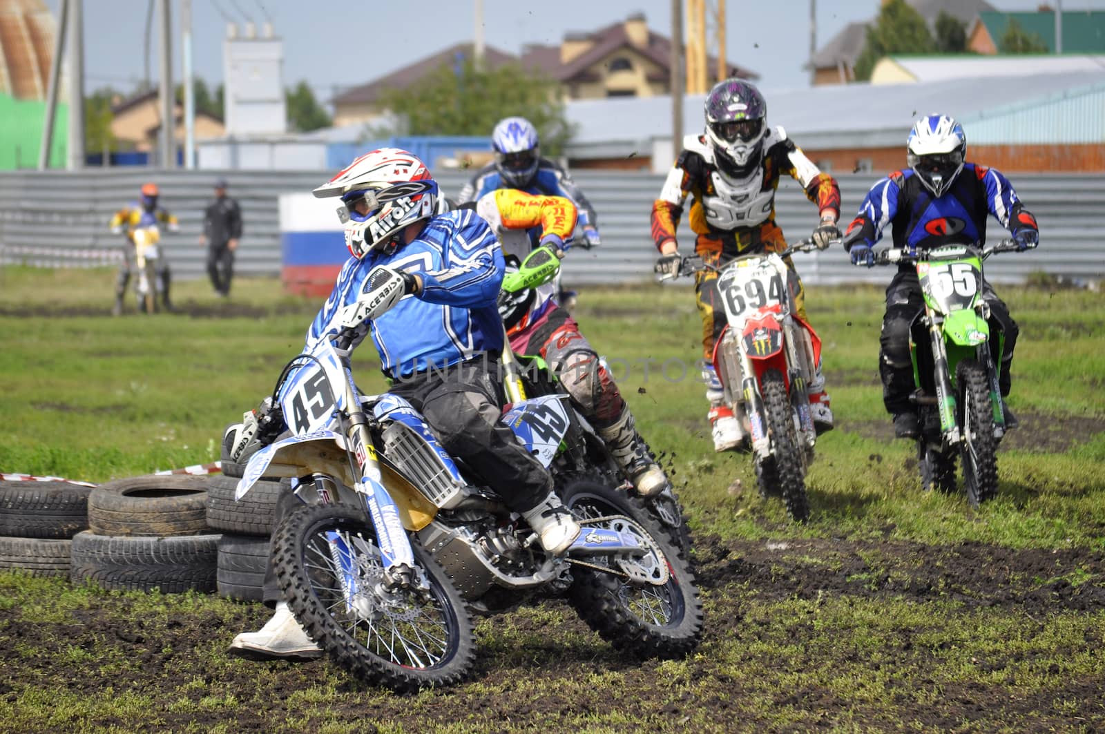 Cross-country race. Motorcyclists on motorcycles enter turn