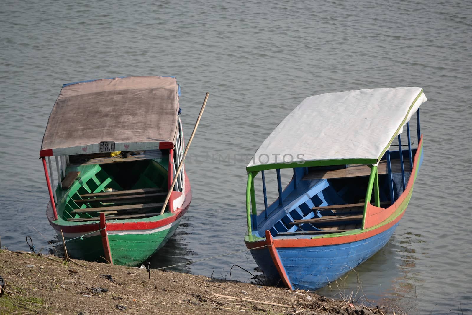 padalarang, indonesia-august 1, 2014: boat that people used for fishing at saguling lake padalarang, west java-indonesia.