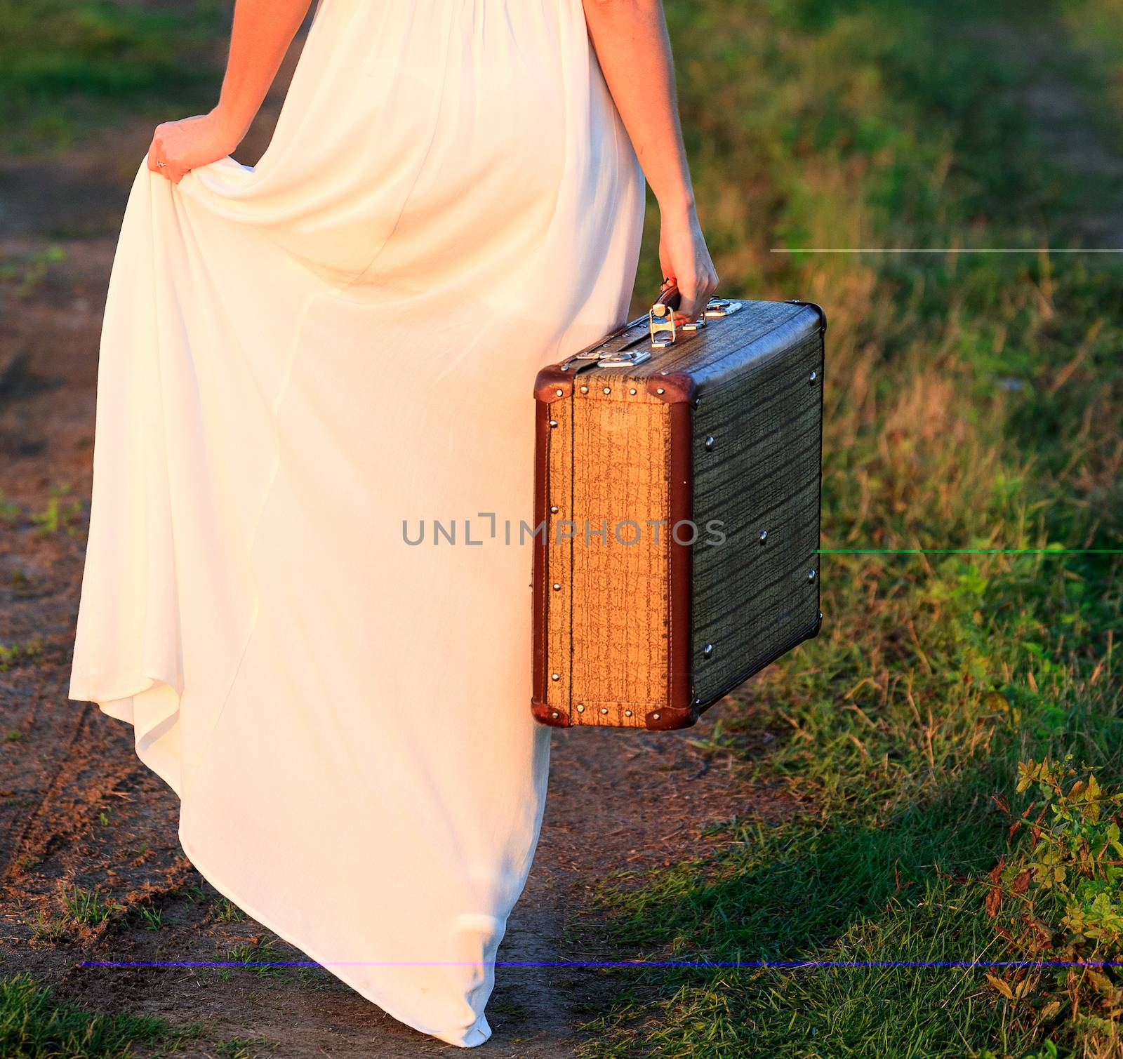 Woman with a suitcase by Nobilior