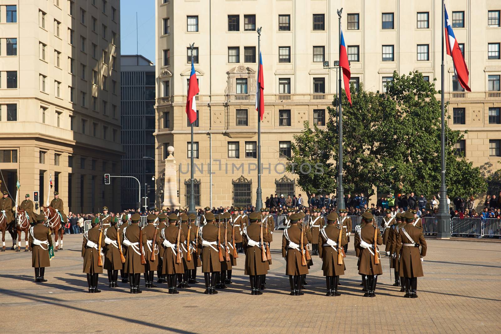 Members of the Carabineros parading as part of the changing of the guard ceremony at La Moneda in Santiago, Chile