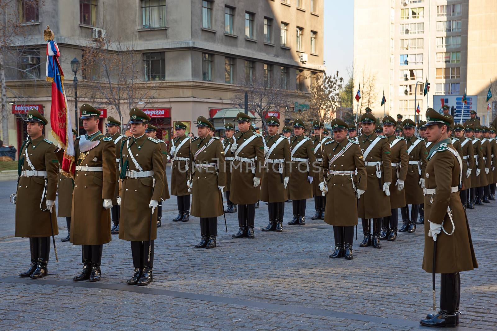 Members of the Carabineros parading as part of the changing of the guard ceremony at La Moneda in Santiago, Chile