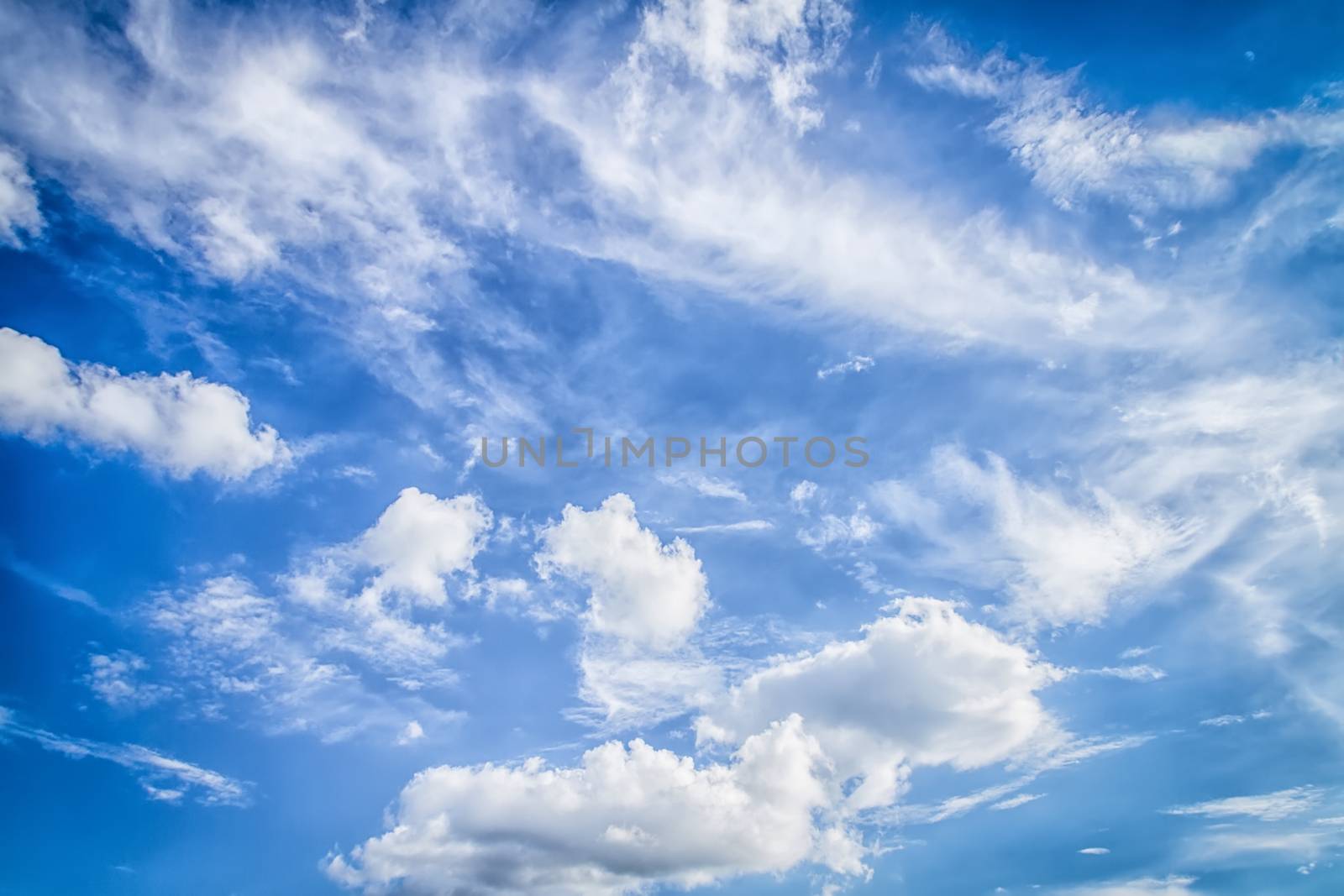blue sky with tiny clouds by nopparats