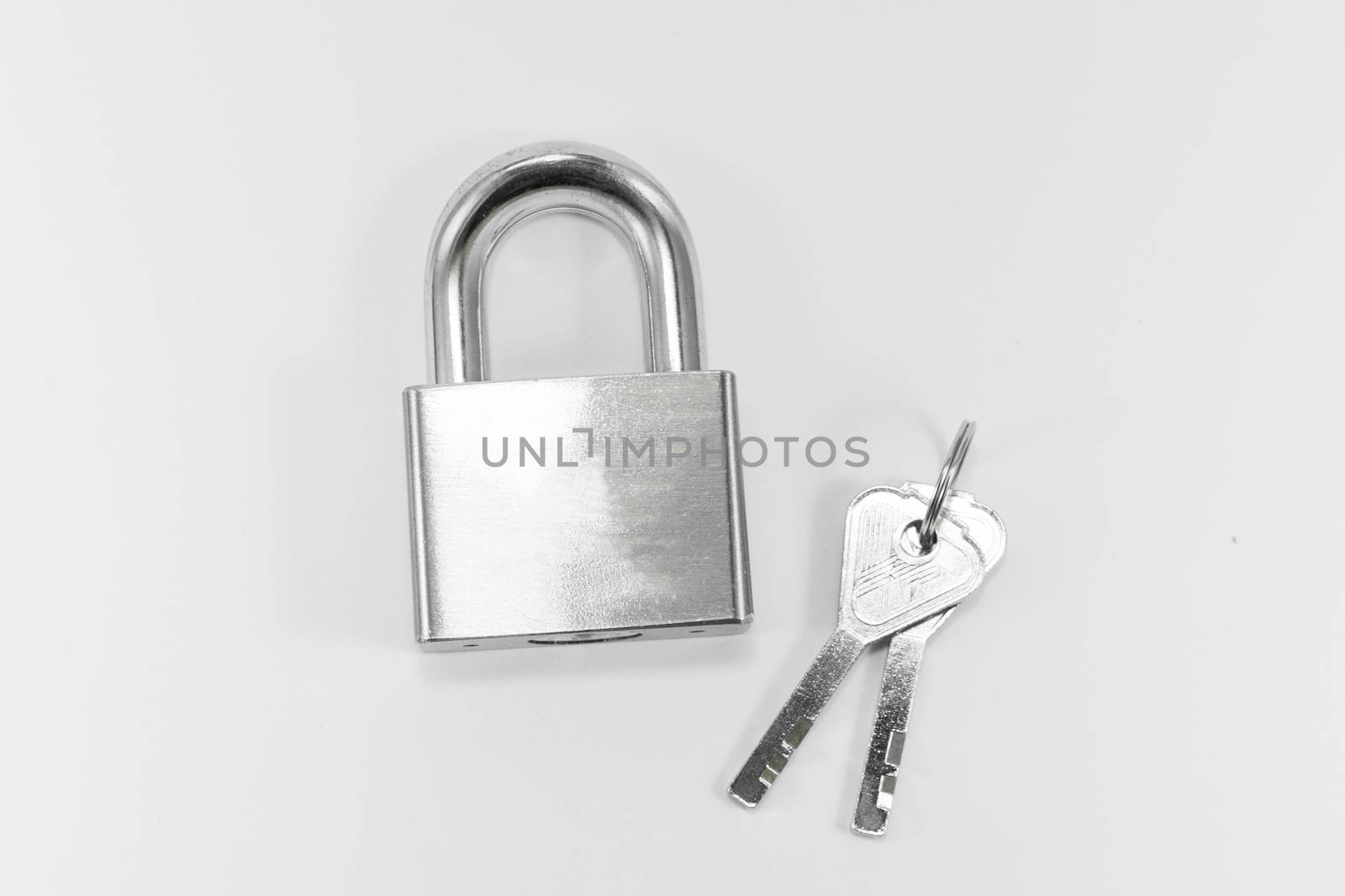 Object Metal lock and key on white background