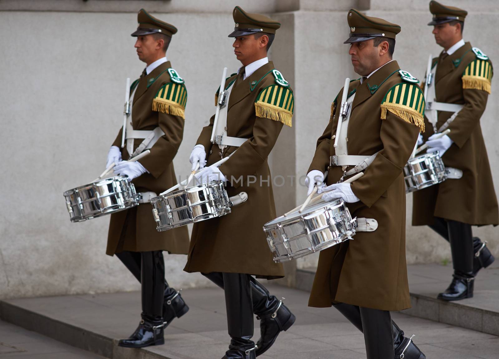 Members of the Carabineros Band marching as part of the changing of the guard ceremony at La Moneda in Santiago, Chile