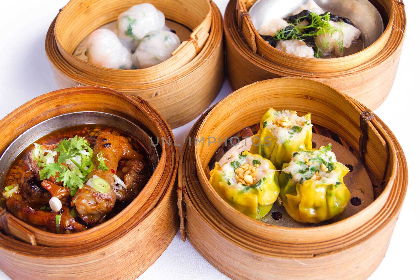 Various dim sum in bamboo steamed bowl by nopparats