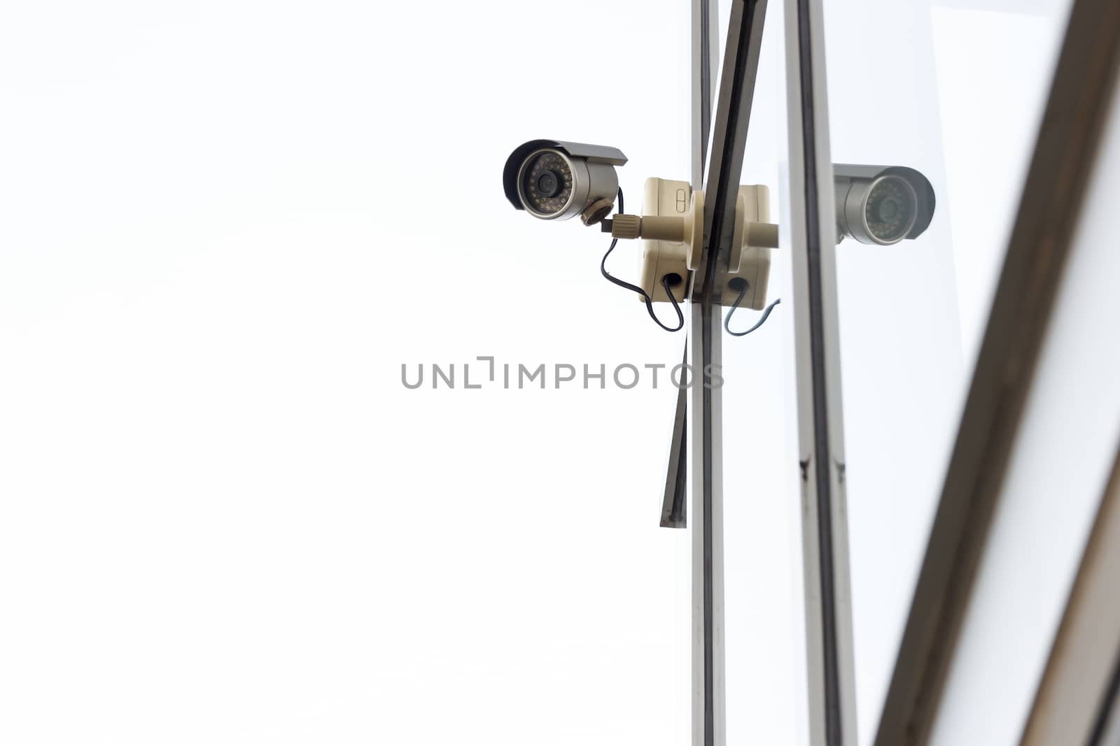 CCTV camera on white background by vitawin