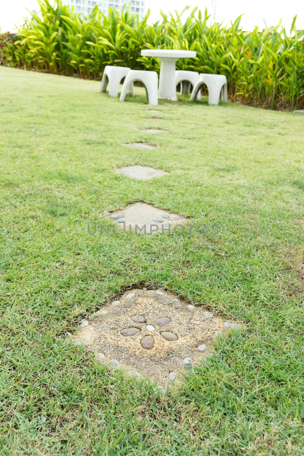 Stone Path with Marble Table in Garden