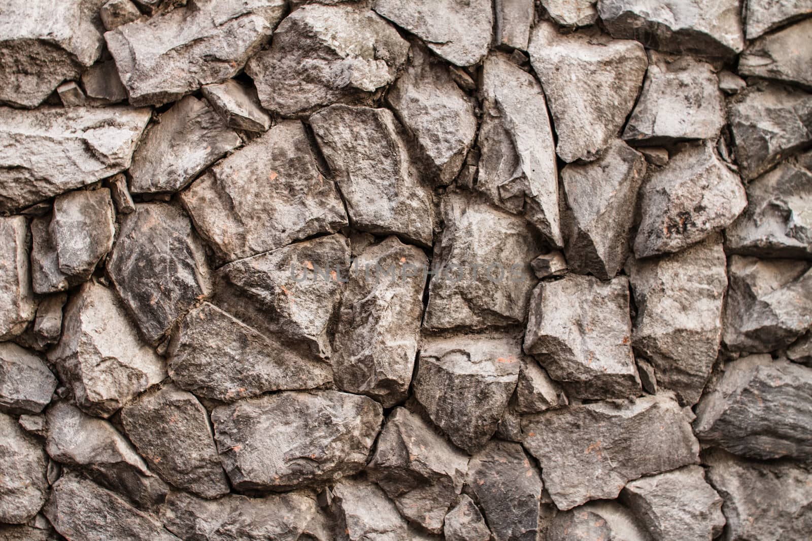 Background of stone wall texture by nopparats