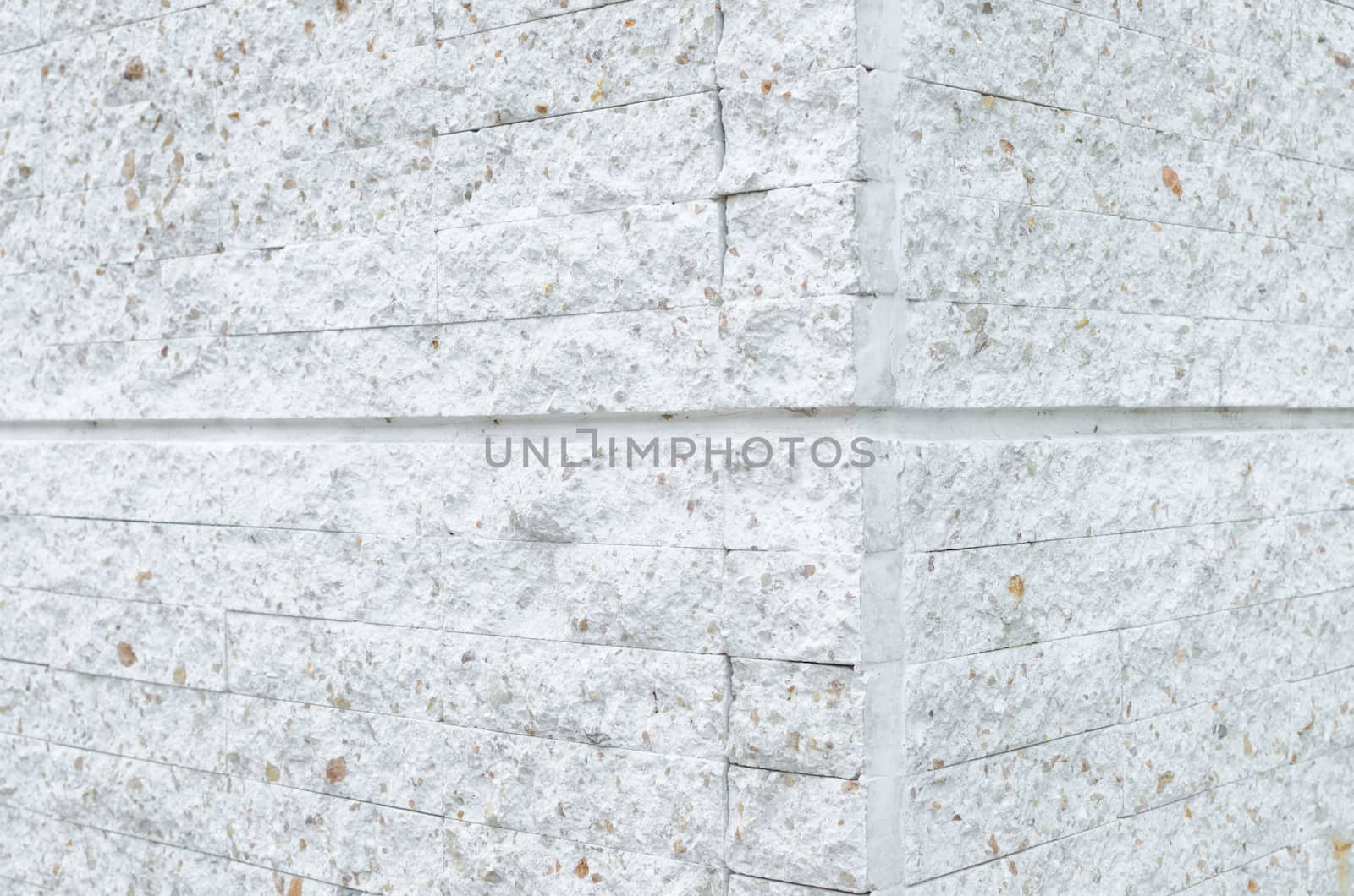 Pattern of White Modern stone Brick Wall Surfaced by nopparats