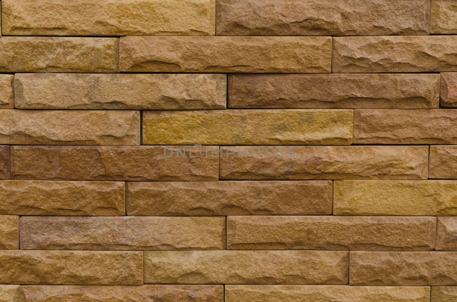 Background of modern brown brick wall by nopparats