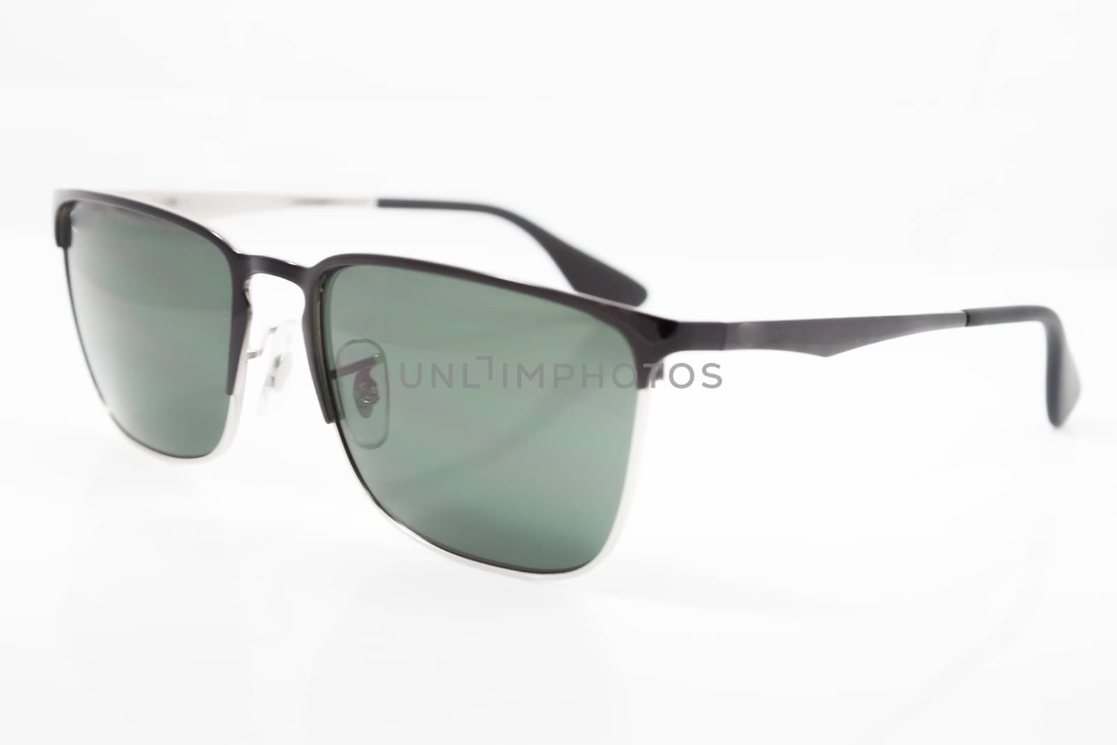 Beautiful sunglasses isolated on white background, stock photo