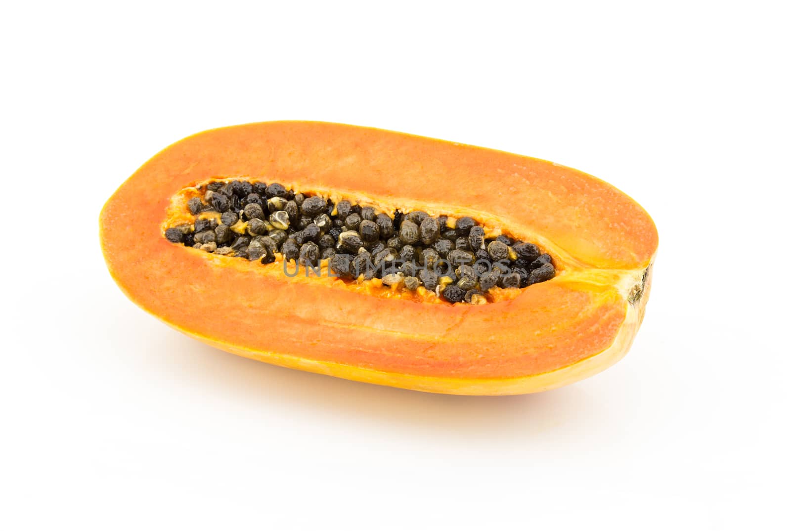 Half papaya fruit on white background