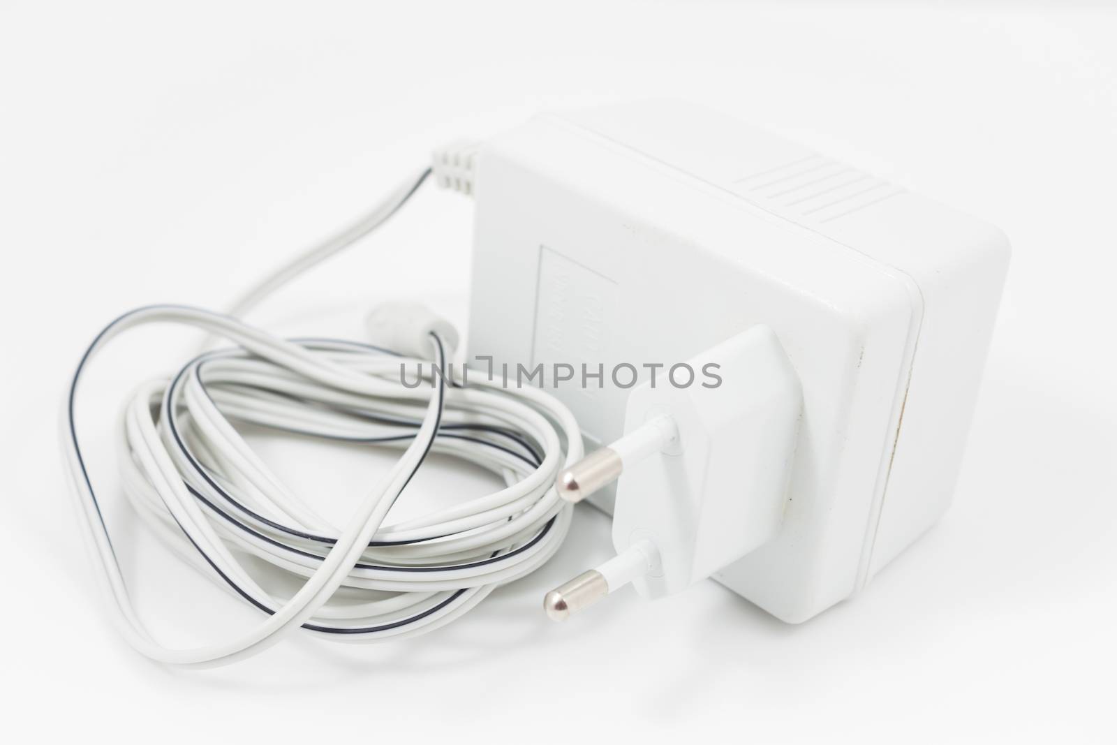 White adapter isolated on white background by punsayaporn