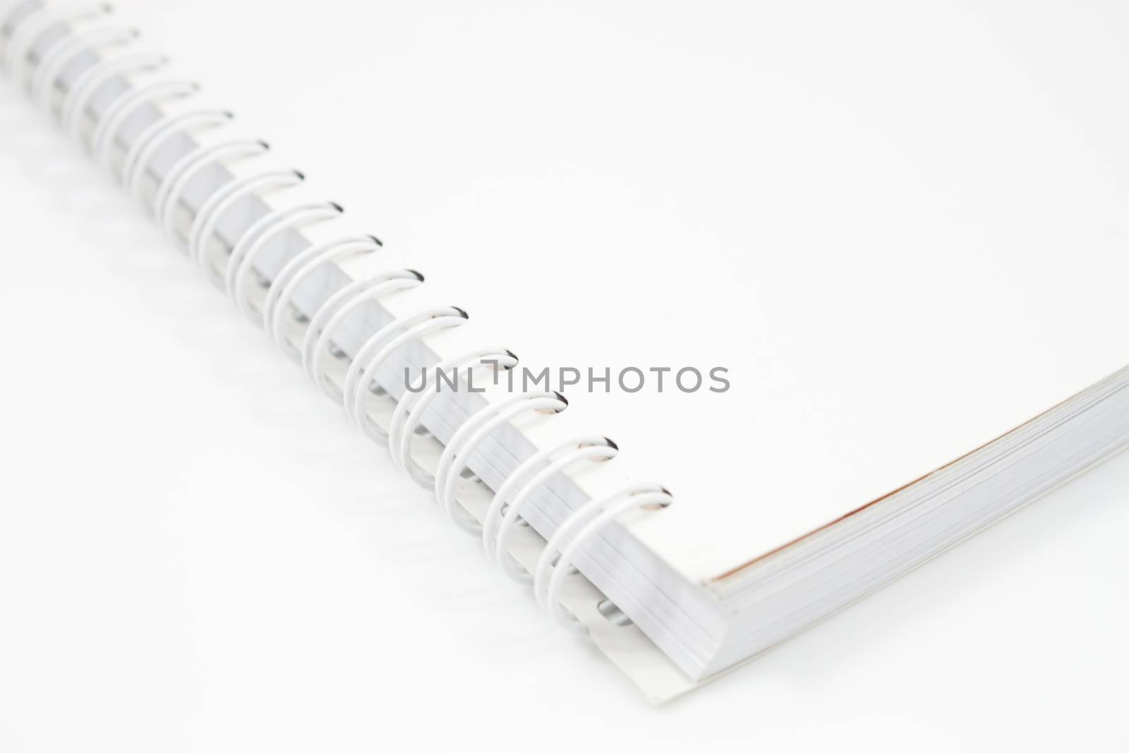 Spiral notebook isolated on white background, stock photo