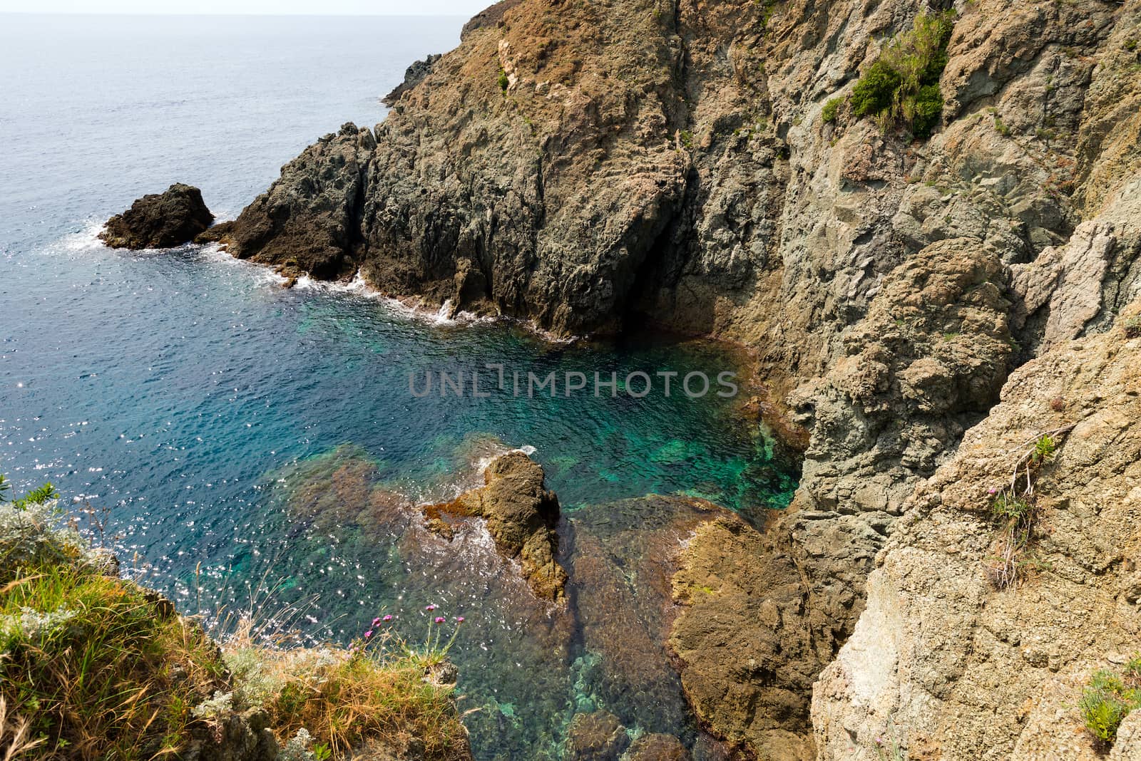 Small bay of the sea with high cliffs at Bonassola, ancient village in Ligurian coast in the east, La Spezia, Italy