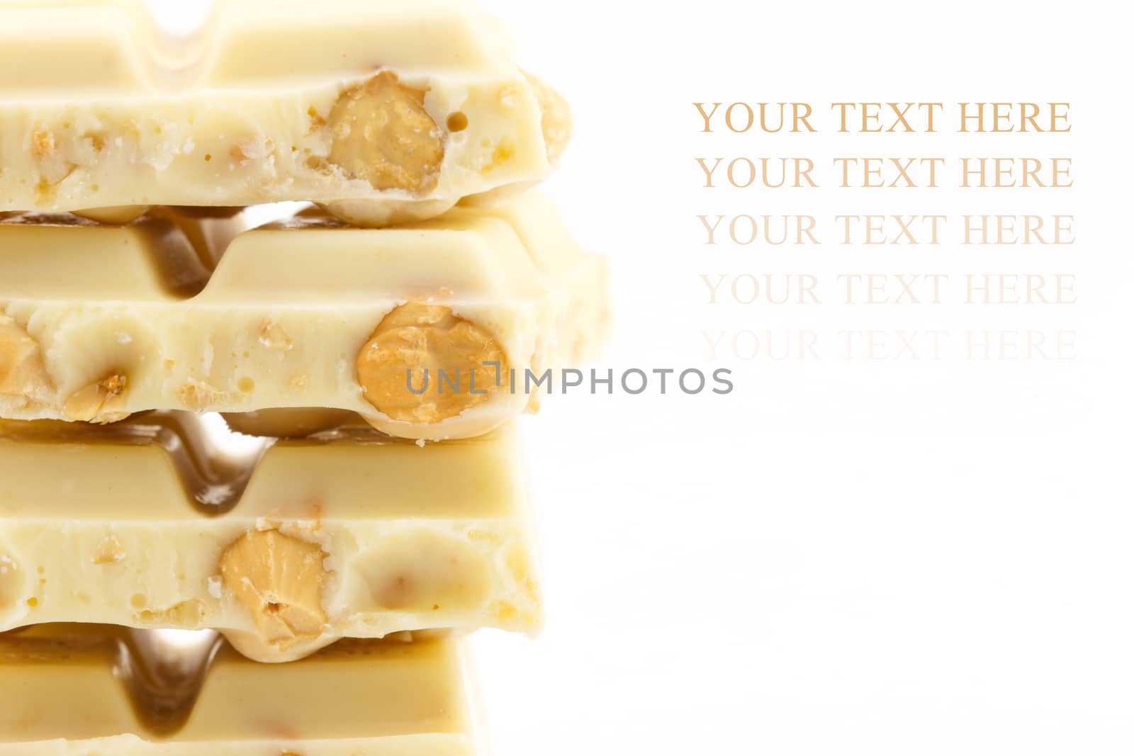Close up white chocolate with nuts isolated on white background