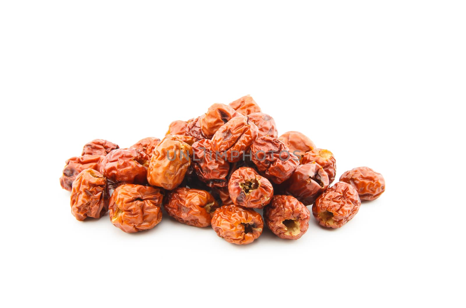 dried jujube fruits on white background by vitawin