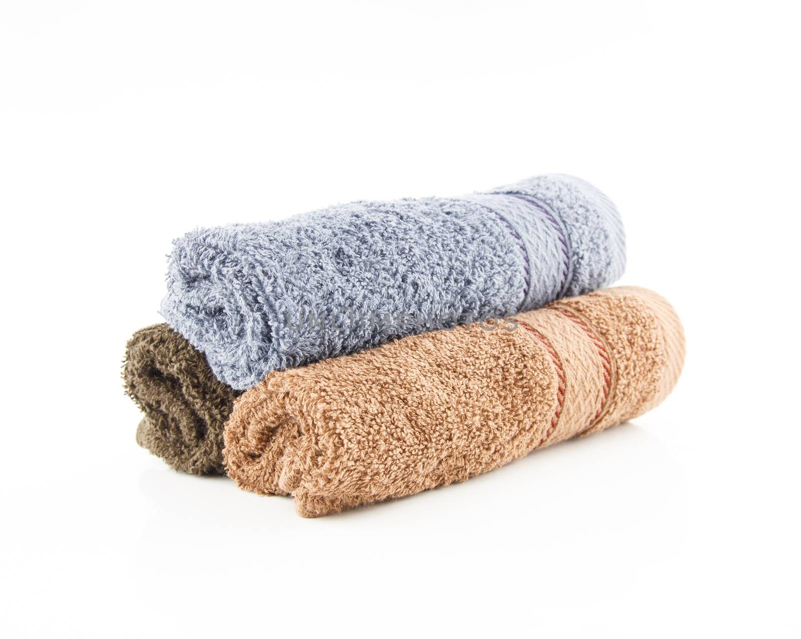 Stack of towels on white background by vitawin