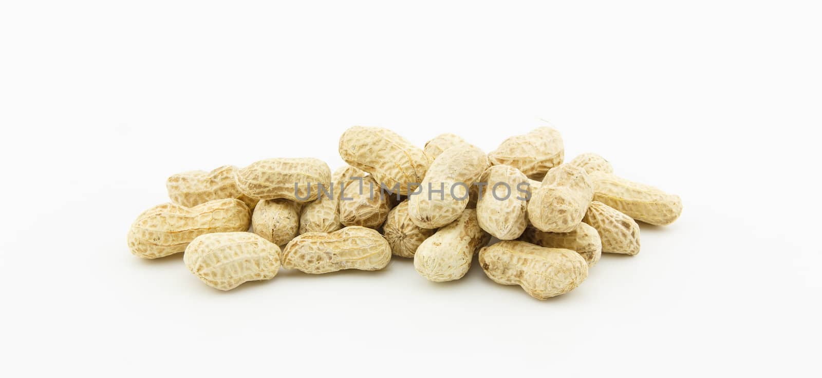 Dried peanuts on white background by vitawin