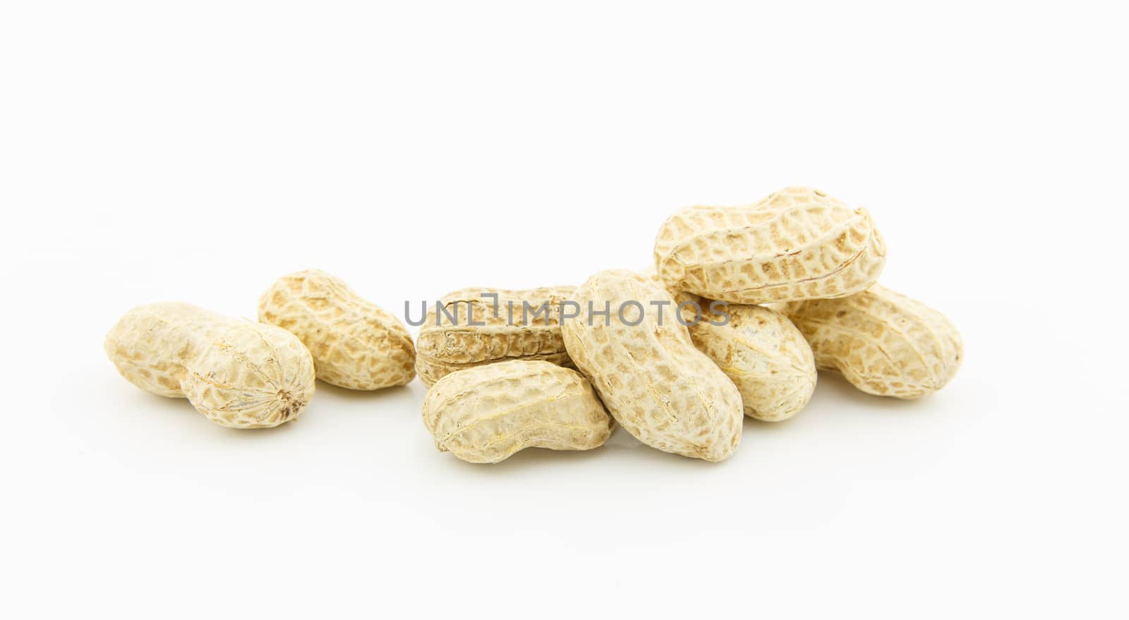 Dried peanuts on white background by vitawin