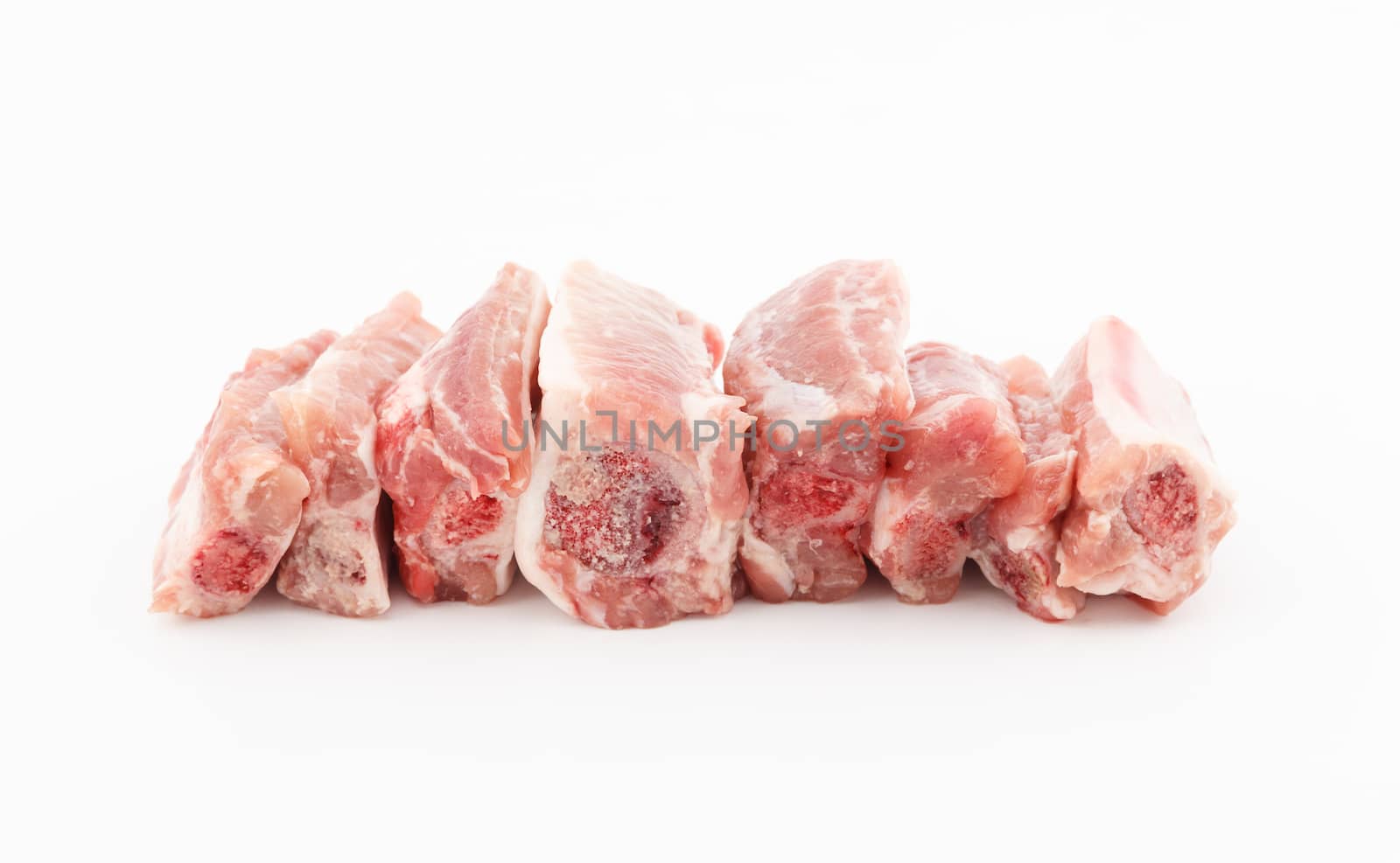 Raw pork short ribs on white background