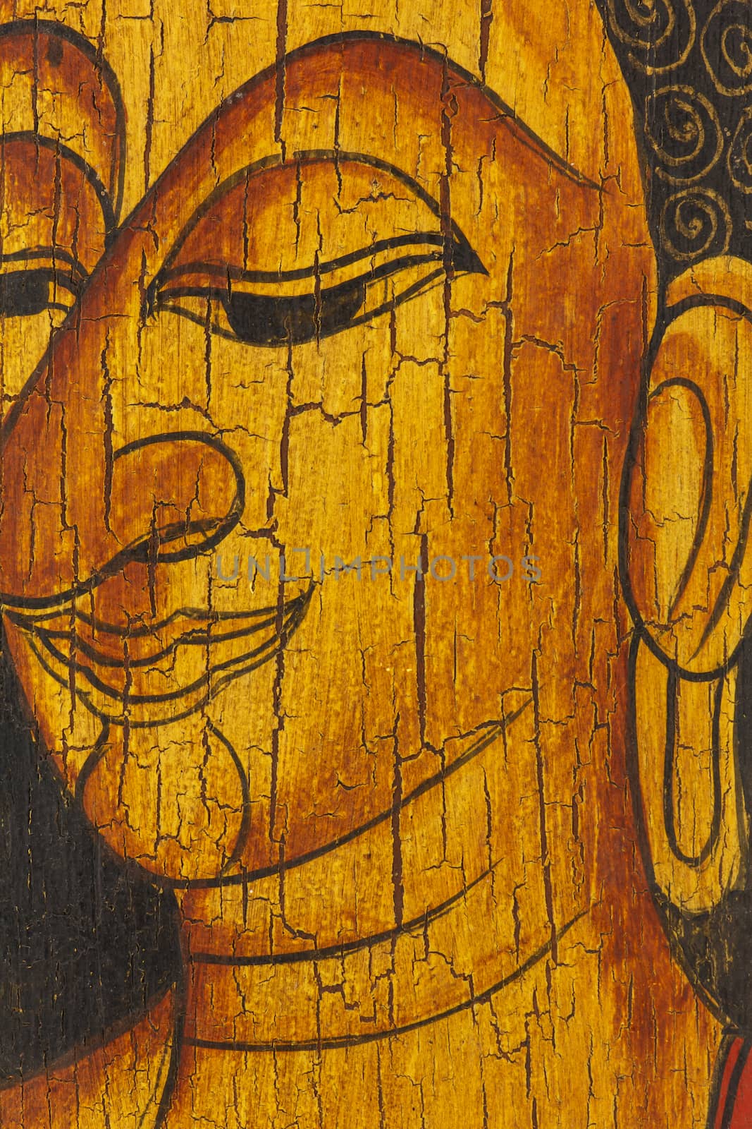 Face of buddha, Thai style painted on old wood