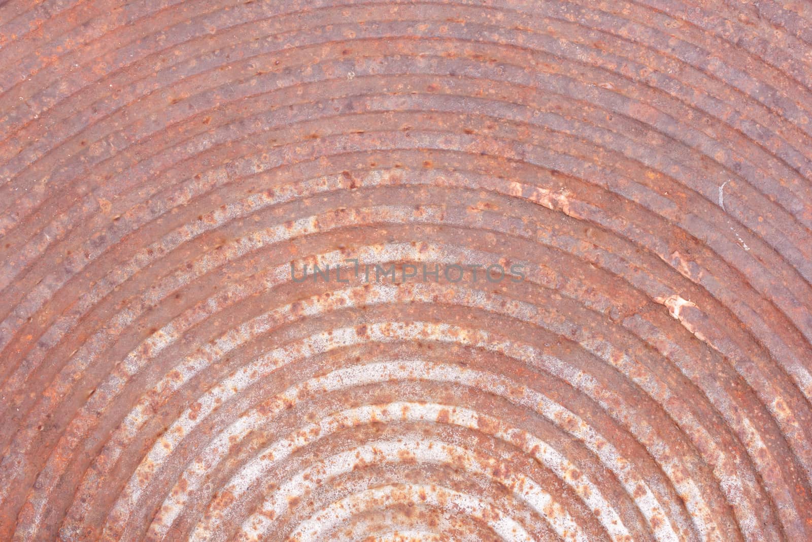 Rusted manhole cover,curve line pattern Metal Texture