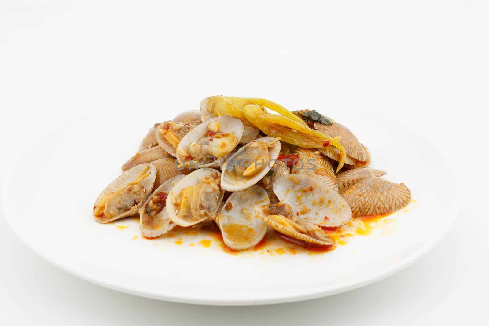 stir fried clams with roasted chili paste,thai food on white background