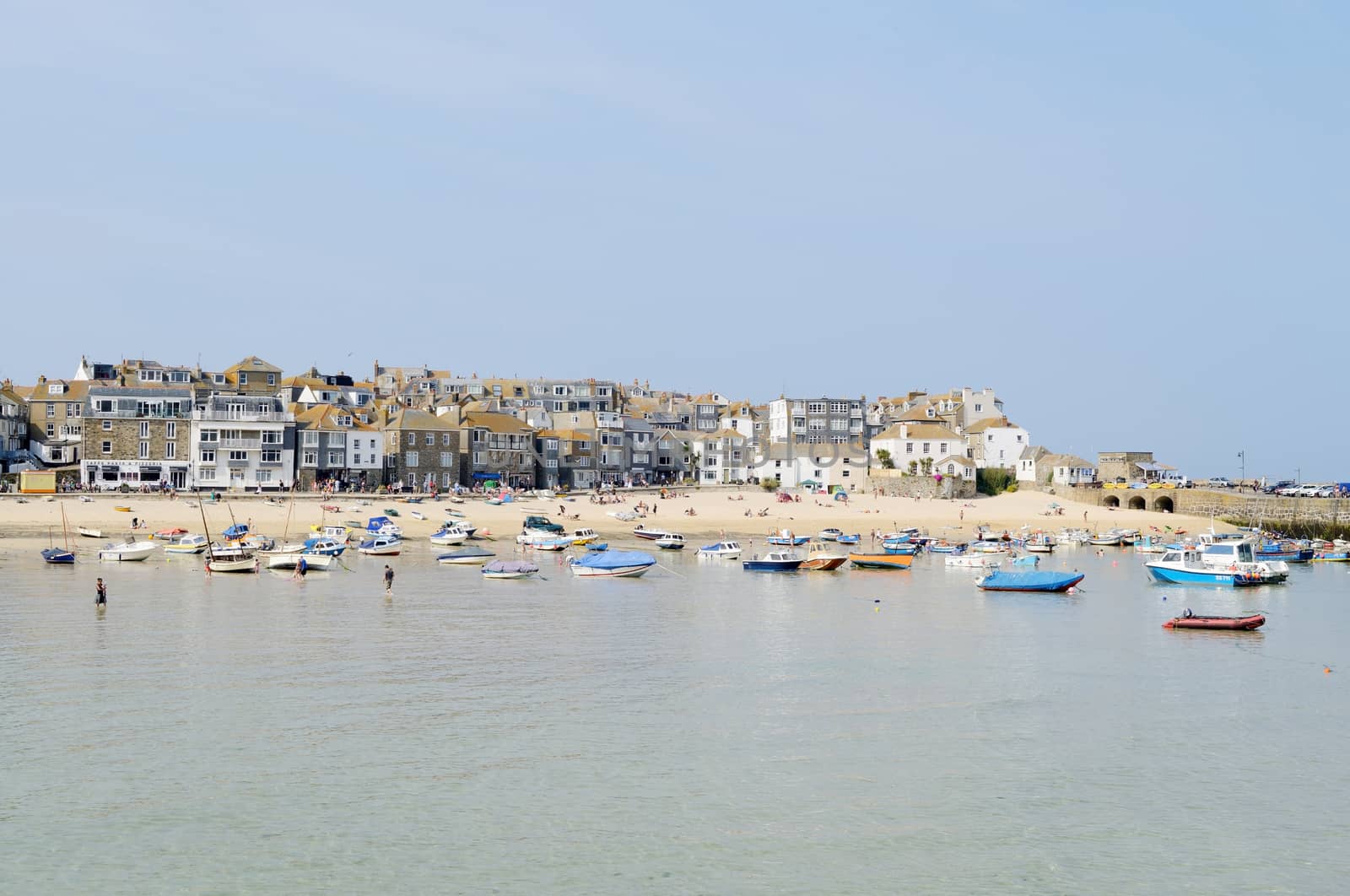 Cornish fishing boats in harbour on a sunny day in St Ives