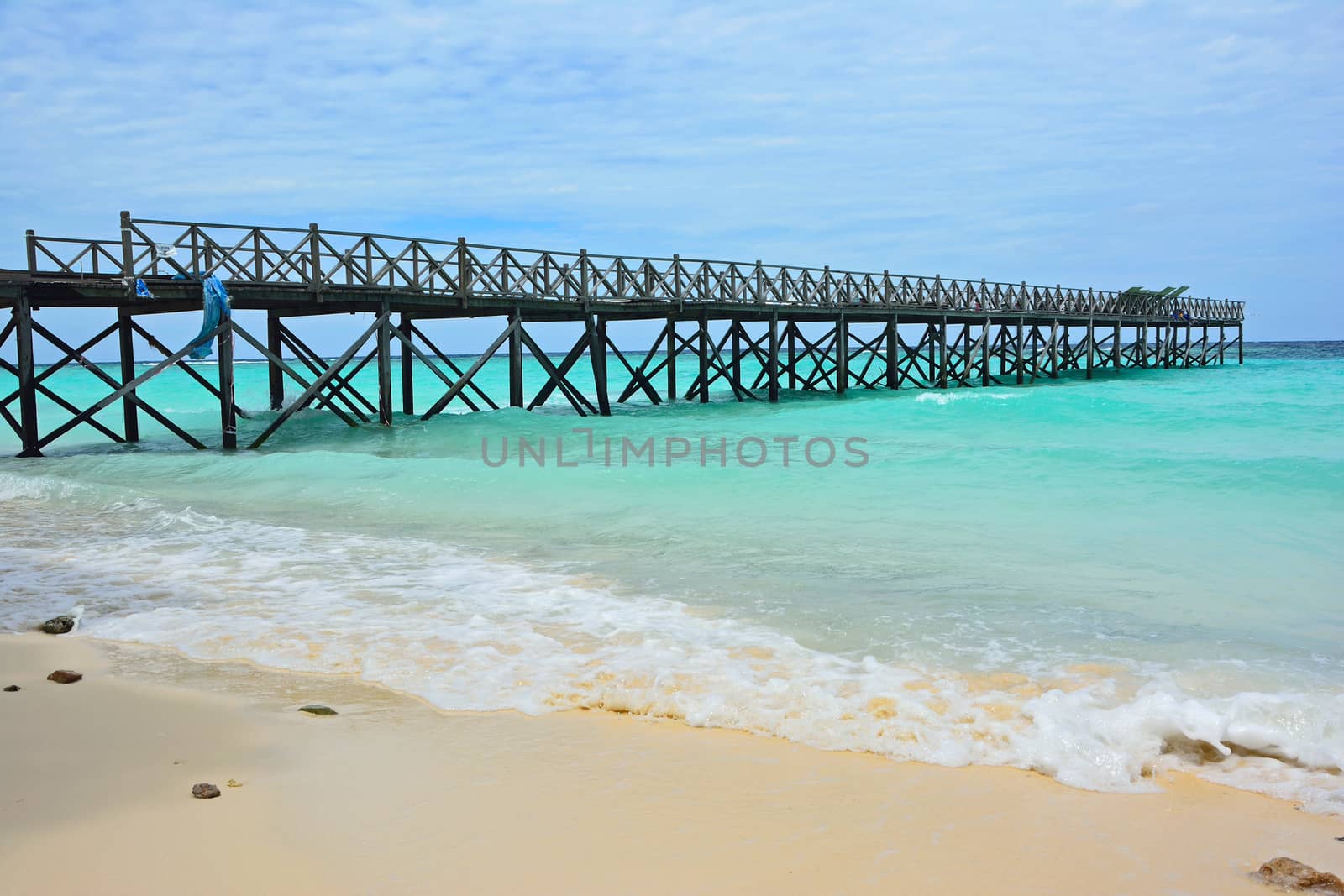 Wooden bridge in Sipadan island, scuba-diving paradise by think4photop