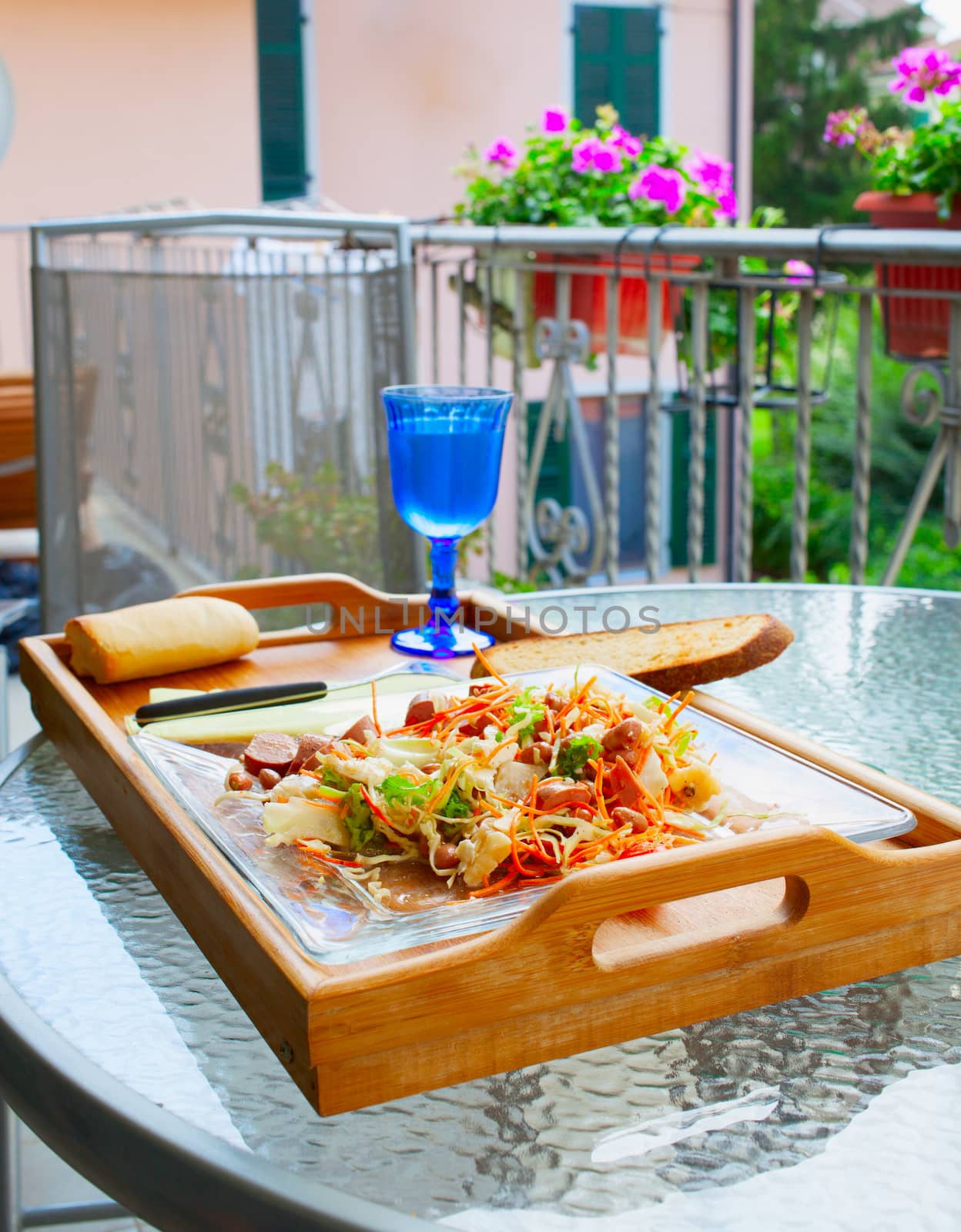 Salad over a tray, for outdoor lunch on the balcony