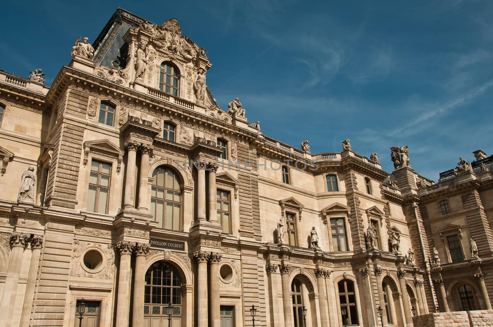 Louvre museum in Paris by NeydtStock