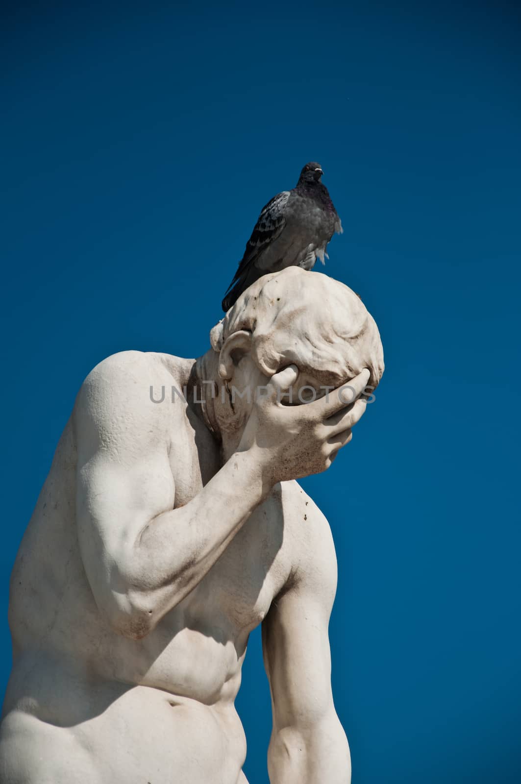 Statue in Tuileries garden in Paris