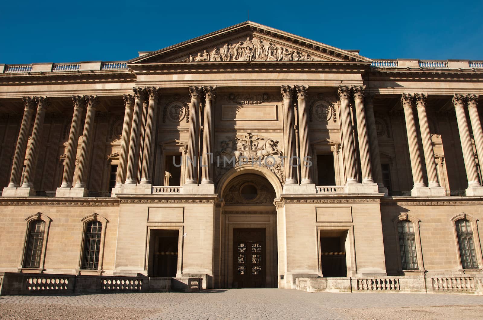 Louvre museum in Paris by NeydtStock