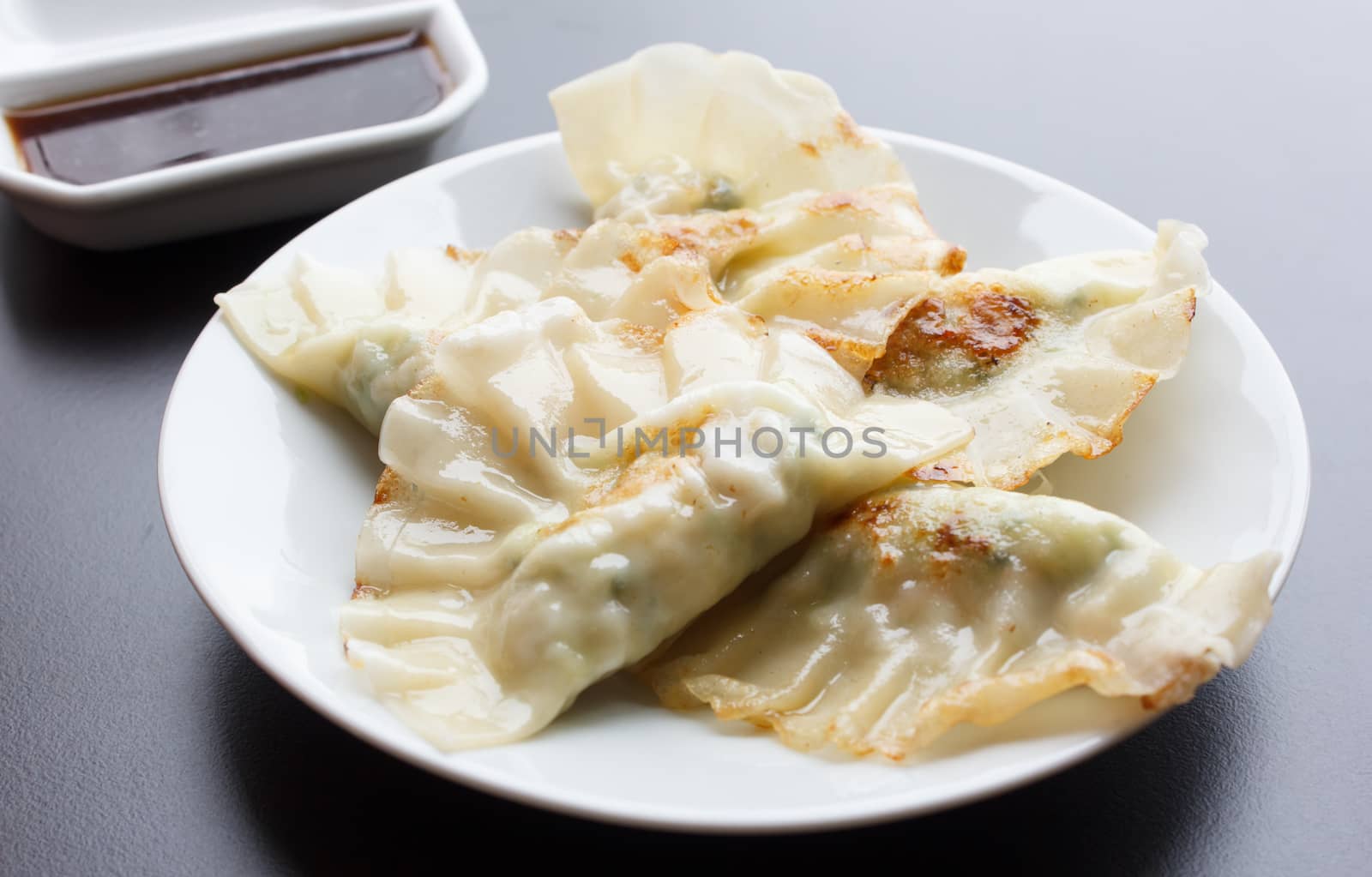 Fried Dumpling - Gyoza on plats with Sauce