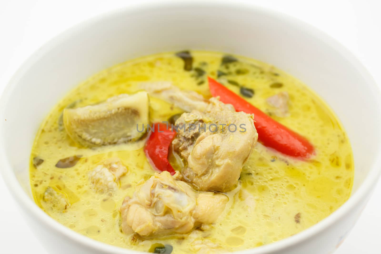 Green Curry with Chicken isolated on white background by vitawin