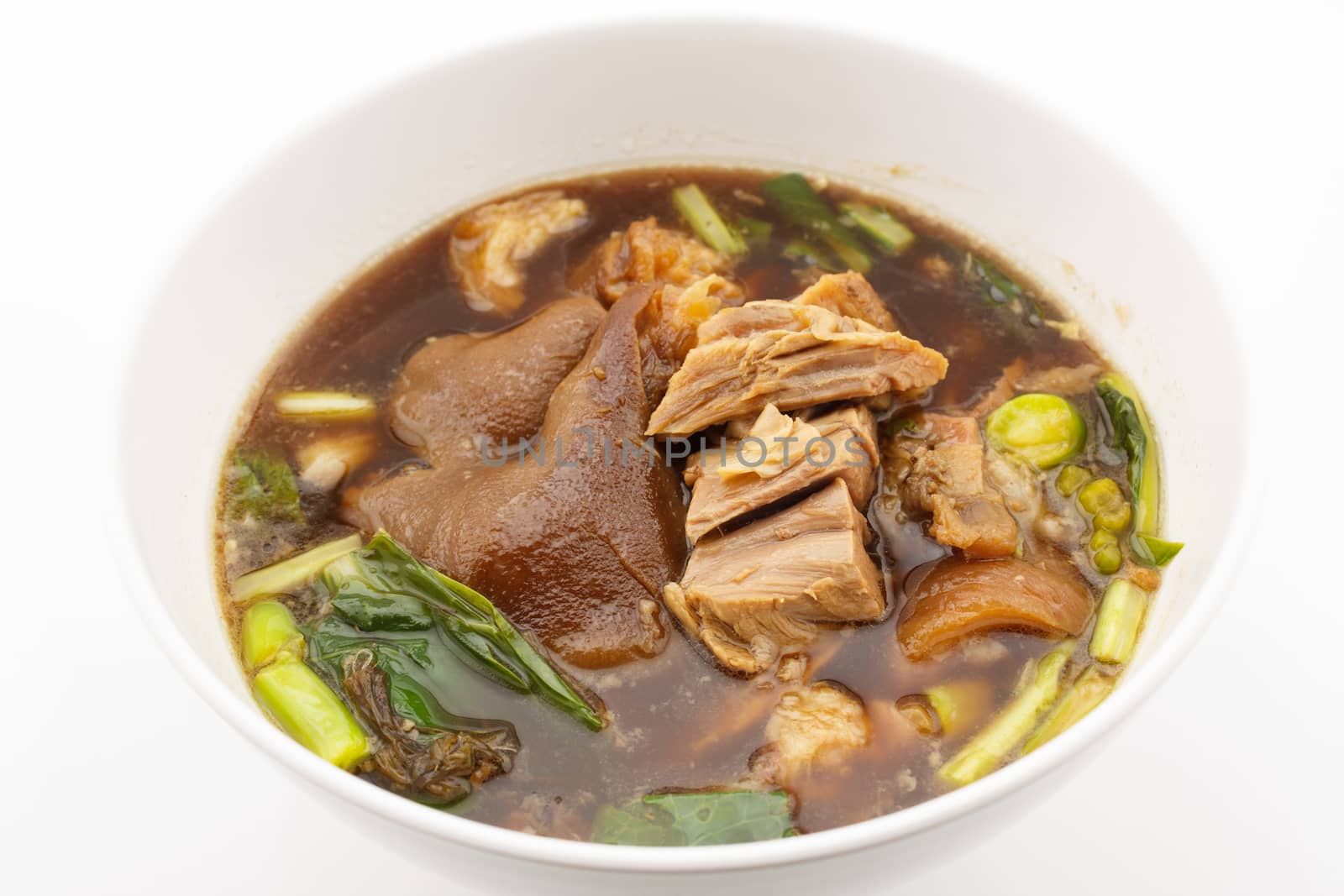 pork leg stewed in the gravy with Collards isolated on white background