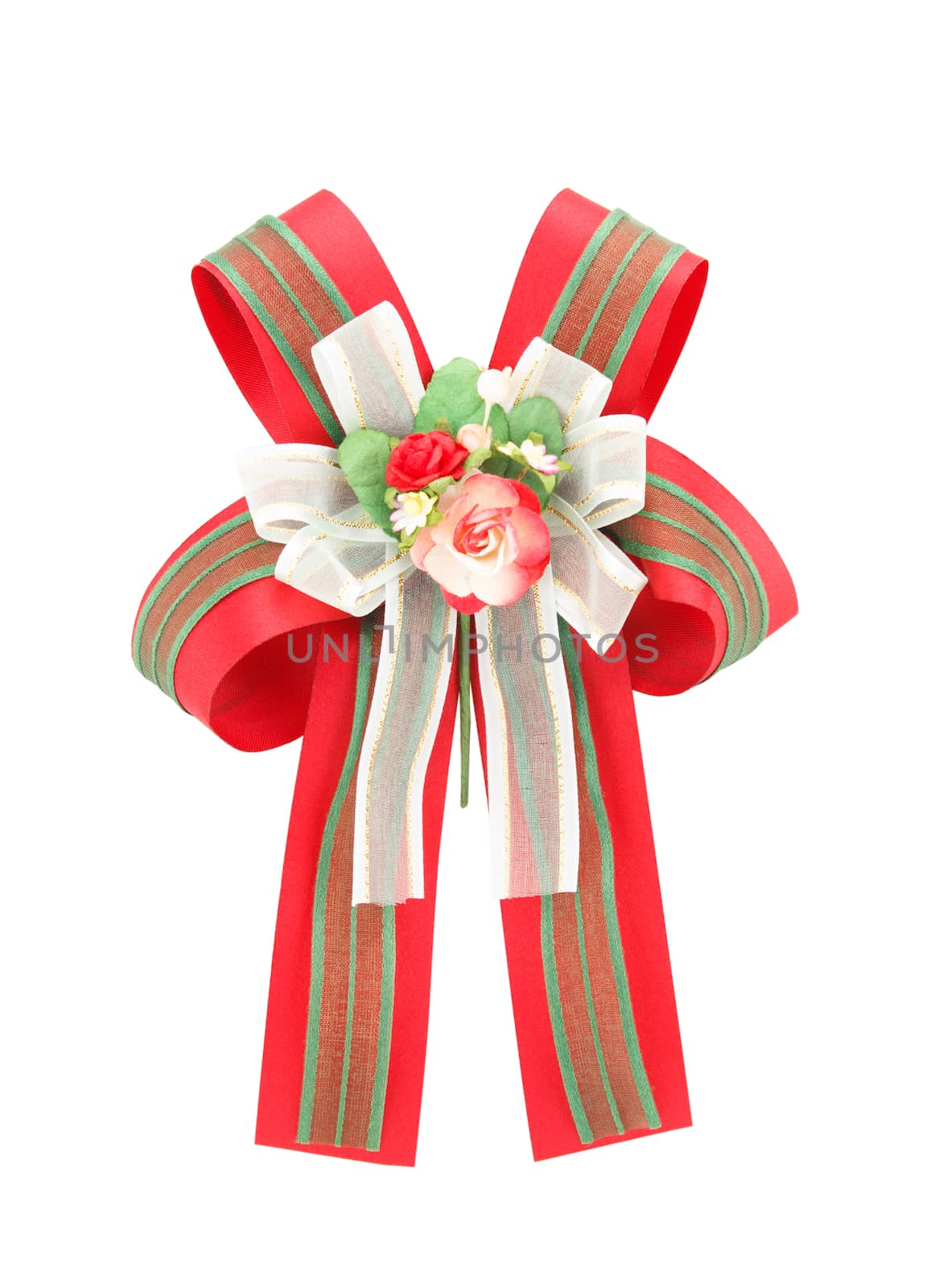 green and red bow with artificial rose flowers on white backgrou by vitawin