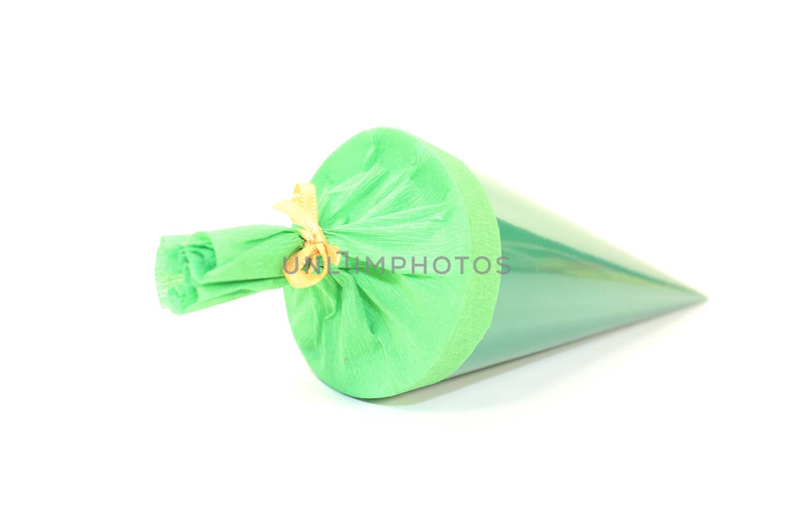 green school cone with yellow ribbon on a light background