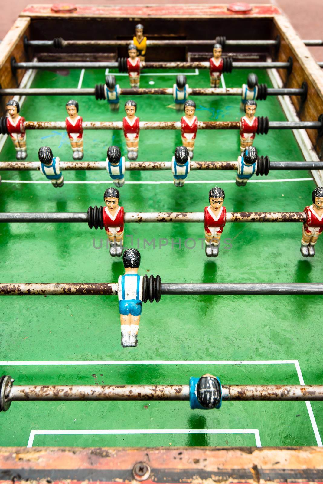 part of an old table soccer game - foosball table